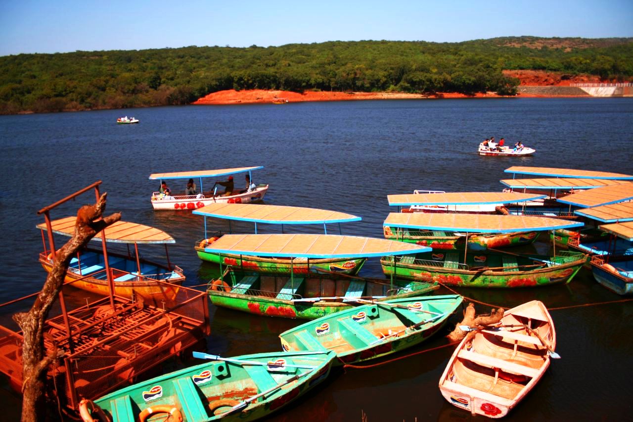 Boating at Venna Lake surrounded by green hills, Mahabaleshwar